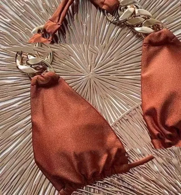 Brown women's tube-top bikini with adjustable halter neck strap and ring detail, shown with a split bottom.