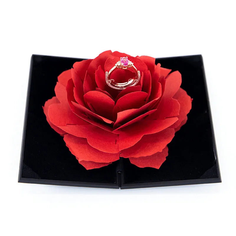 Red heart-shaped rotating ring box with 3D love design and rose flower pattern for jewellery storage