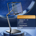 Universal alloy lazy bracket holding a mobile phone on a bedside table