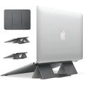 Ringke Folding Stand2 portable laptop stand in grey, folded open with a notebook placed on top