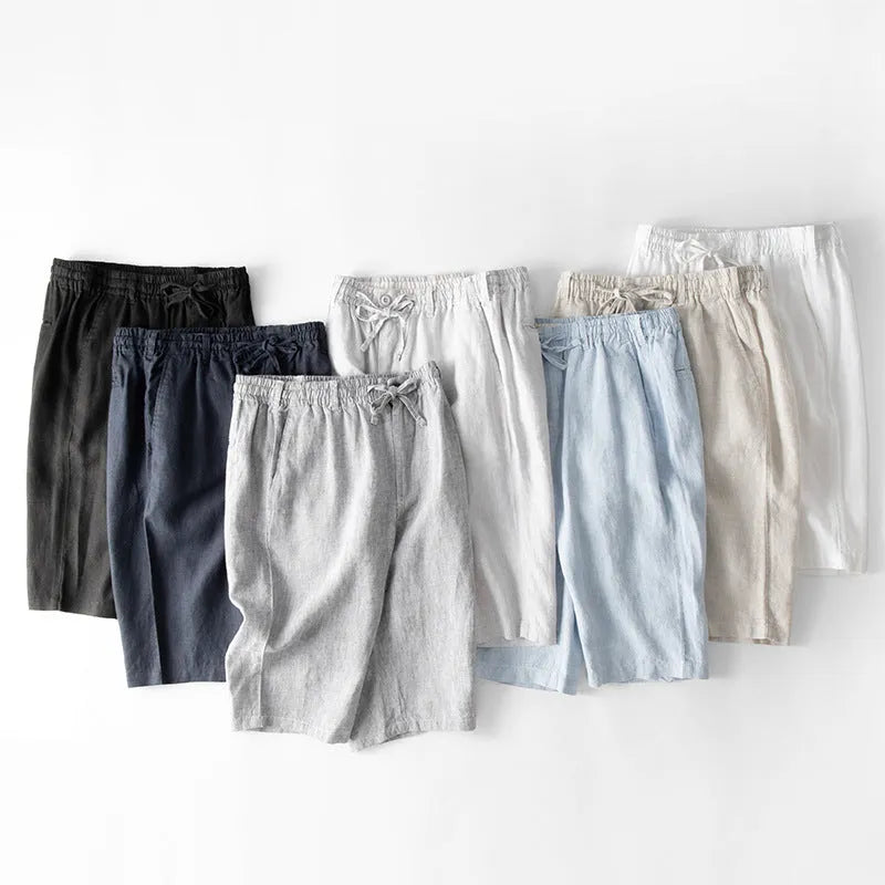 Men's light grey linen capris with straight-leg loose fit on hanger