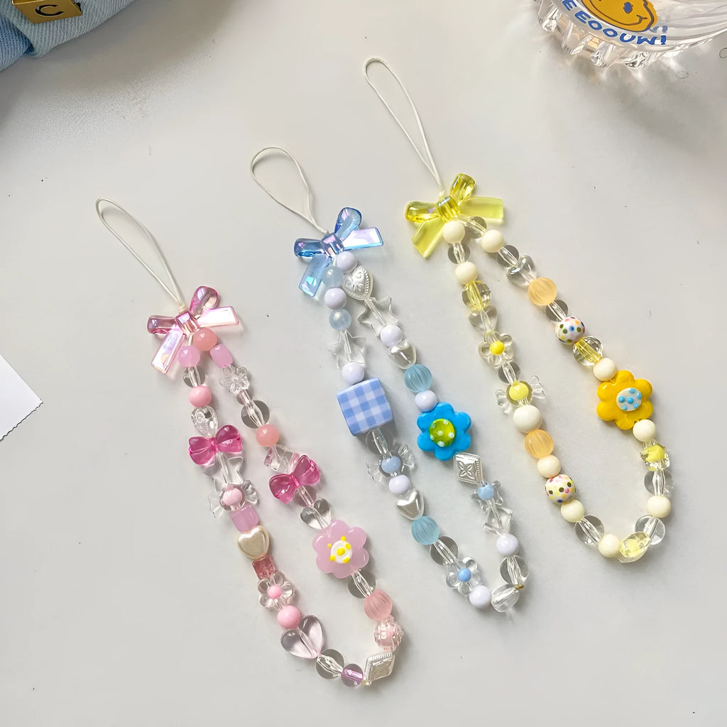 Colourful beaded floral phone lanyard in blue, pink, or yellow on a rope cord.