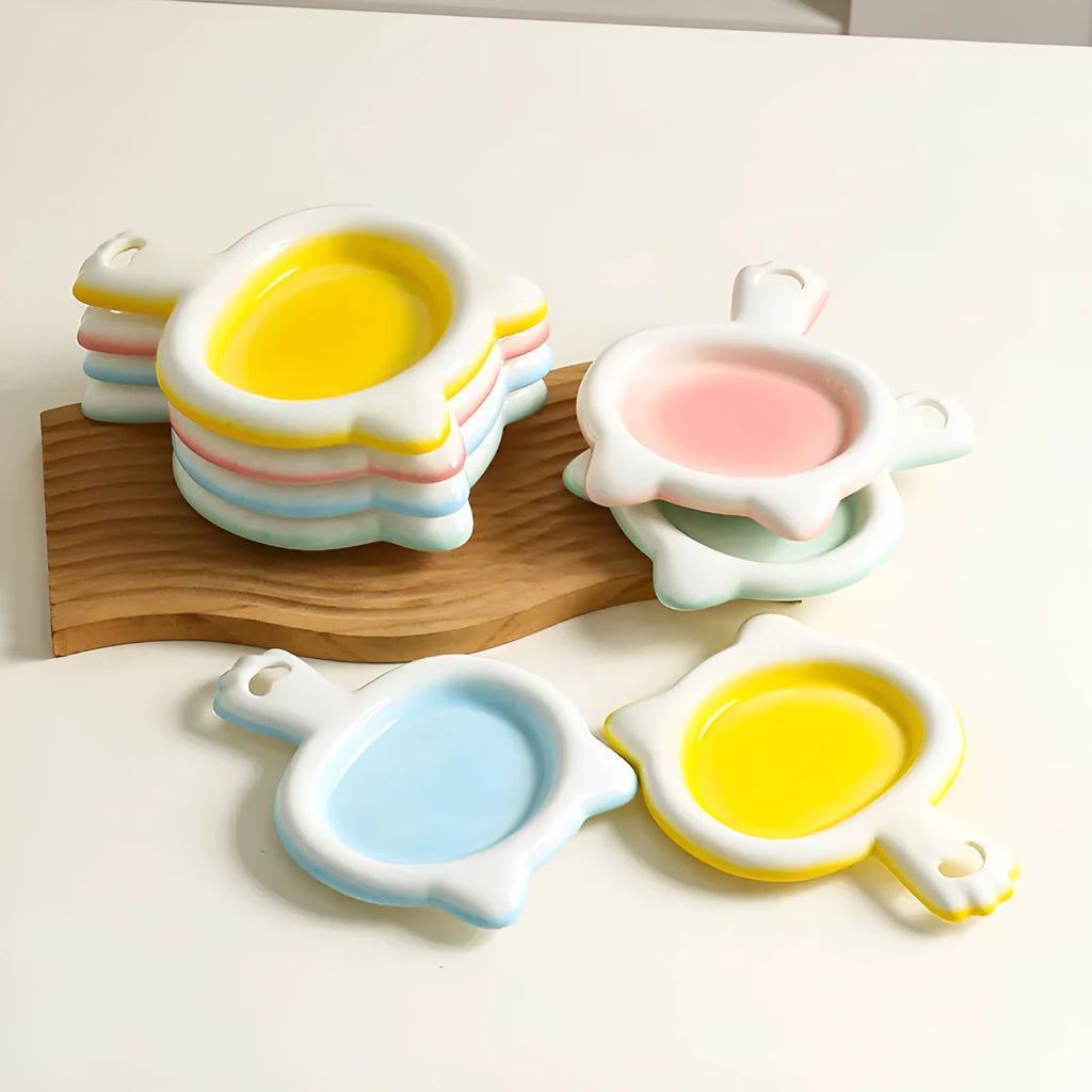 Ceramic cat bowl with shallow design and non-slip rubber base in blue, green, pink or yellow