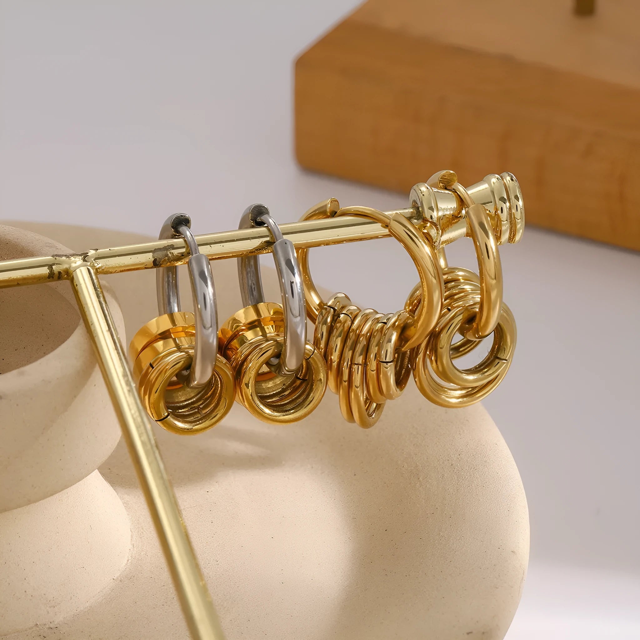 Stainless steel electroplated earrings in INS style, available in two colour options.