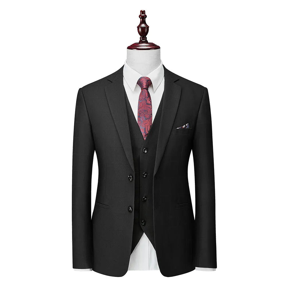Men's navy blue slim fit three-piece suit with jacket, vest, and trousers on hanger