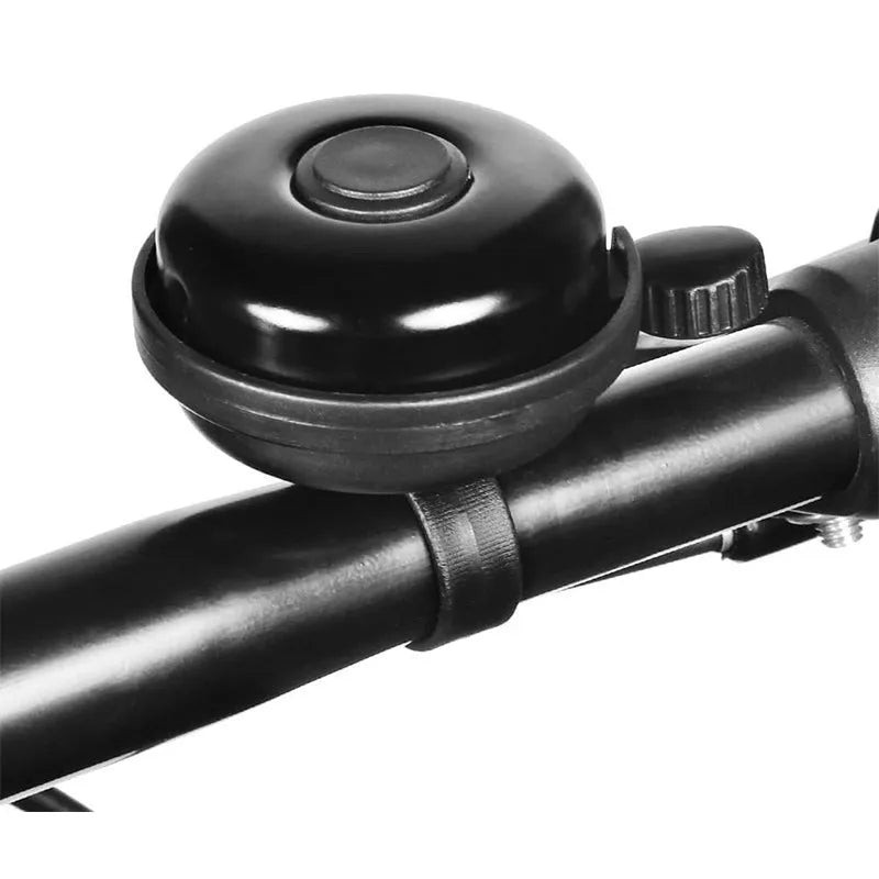 Black bicycle bell with 58mm diameter and ABS plastic construction showing handlebar clamp fixture