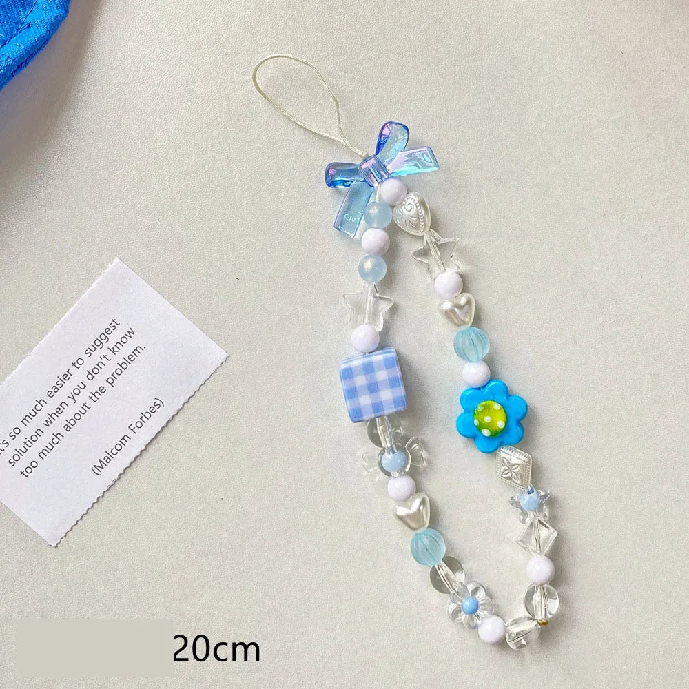 Colourful beaded floral phone lanyard in blue, pink, or yellow on a rope cord.