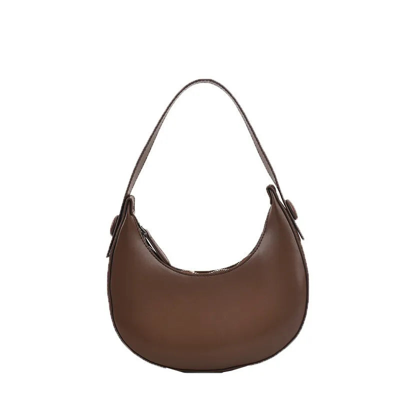 Retro dumpling-shaped women's shoulder bag in PU, shown in cream yellow, with dimensions 21x20x6cm.