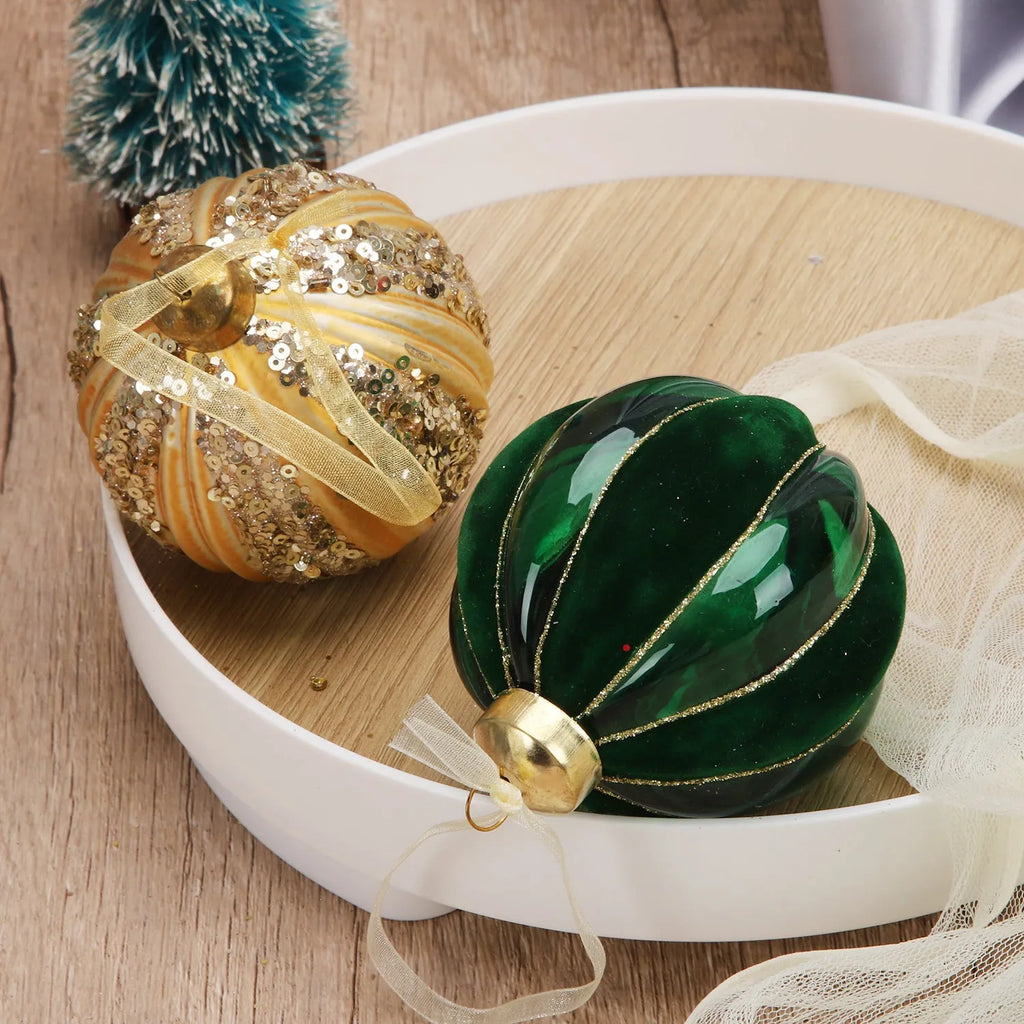 Green and yellow flocked stripes on a 80mm blown glass Christmas ball decoration with mosaic surface