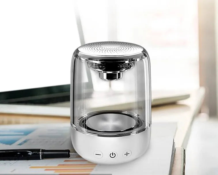 C7 portable Bluetooth speaker in black with variable colour LED light and control buttons