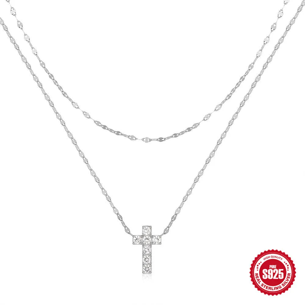 S925 sterling silver necklace with a double layer diamond cross pendant on a clavicle chain.