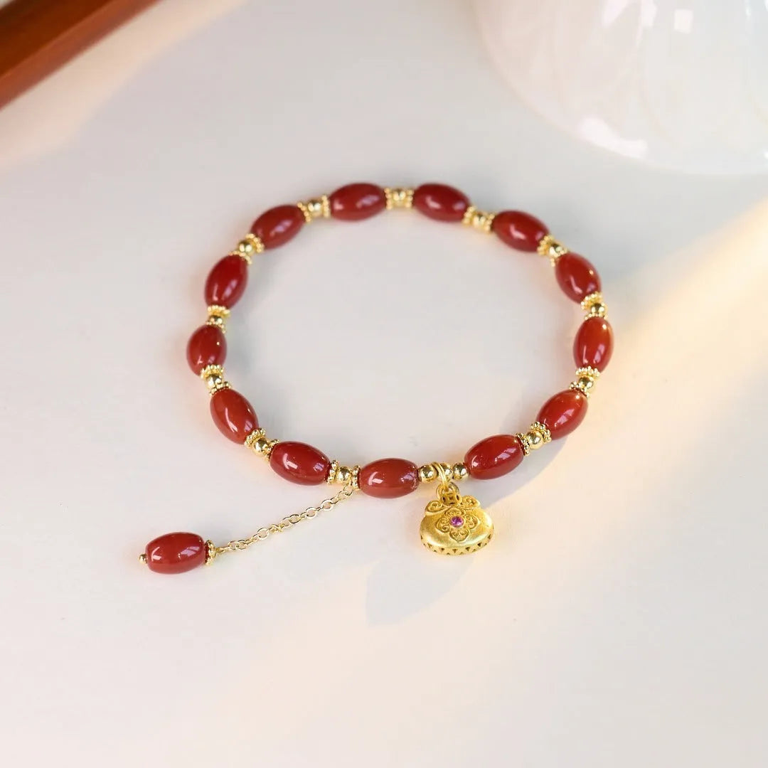 Natural red agate bracelet for women with handmade beads, geometric shape, and auspicious patterns in red agate fortune dumplings colour.