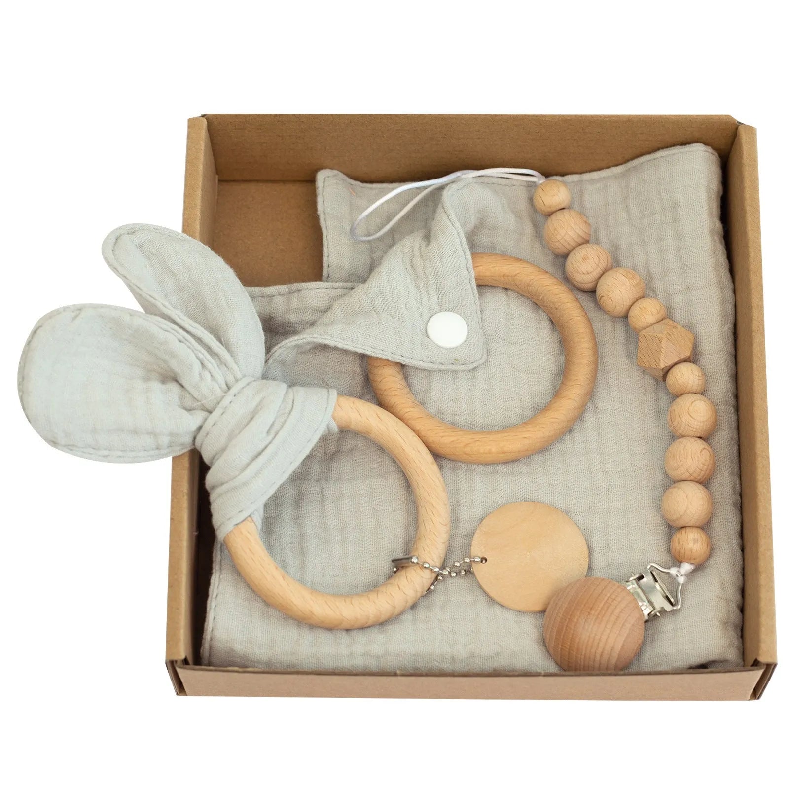 Baby teething gift set with bamboo gauze blanket, wooden chewing ring, woven bell, and developmental toys