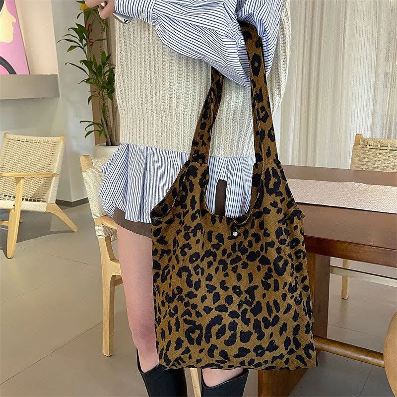 Retro corduroy leopard print shoulder bag with soft vertical square shape and open outer pocket