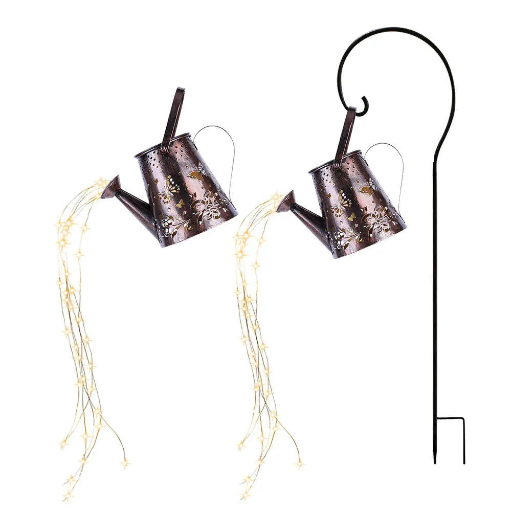 Tapered butterfly pattern iron solar garden lamp in warm white.