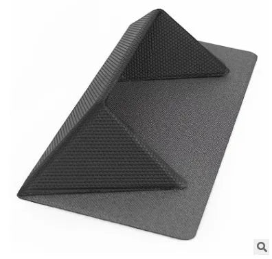 Blue foldable laptop cooling stand with non-slip surface shown open and closed, next to a 15-inch notebook.