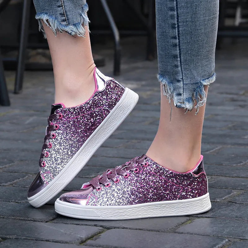 Women's black, pink and gold sequin casual low-top lace-up shoes with round toe and rubber sole.