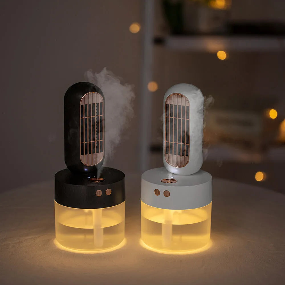 Small black and white oscillating humidifier fan with mechanical controls and charging capability