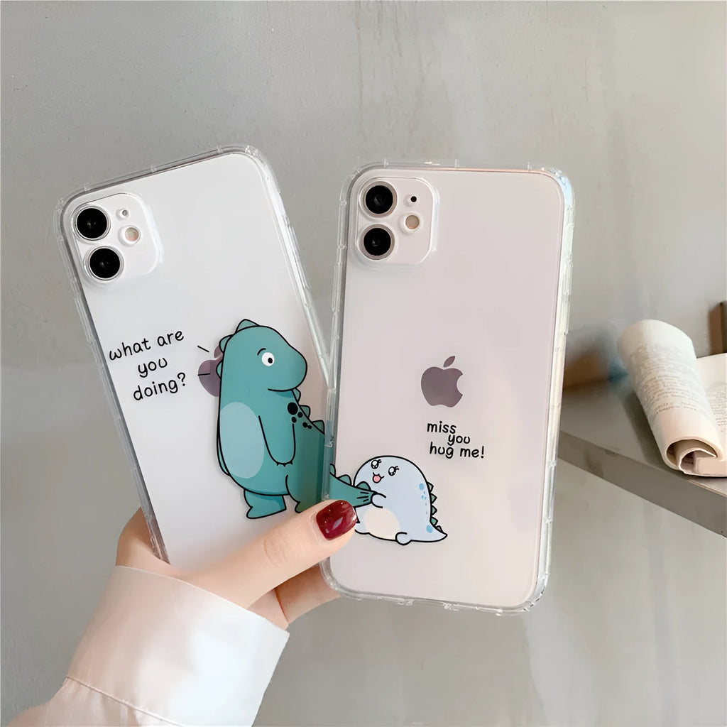 Transparent iPhone case with dinosaur couple design showing airbag anti-fall protection