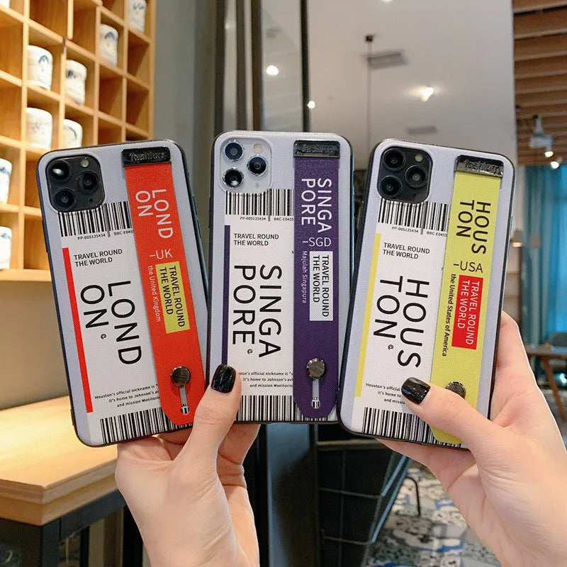 Red mobile phone case for iPhone with attached wristband showing back cover design