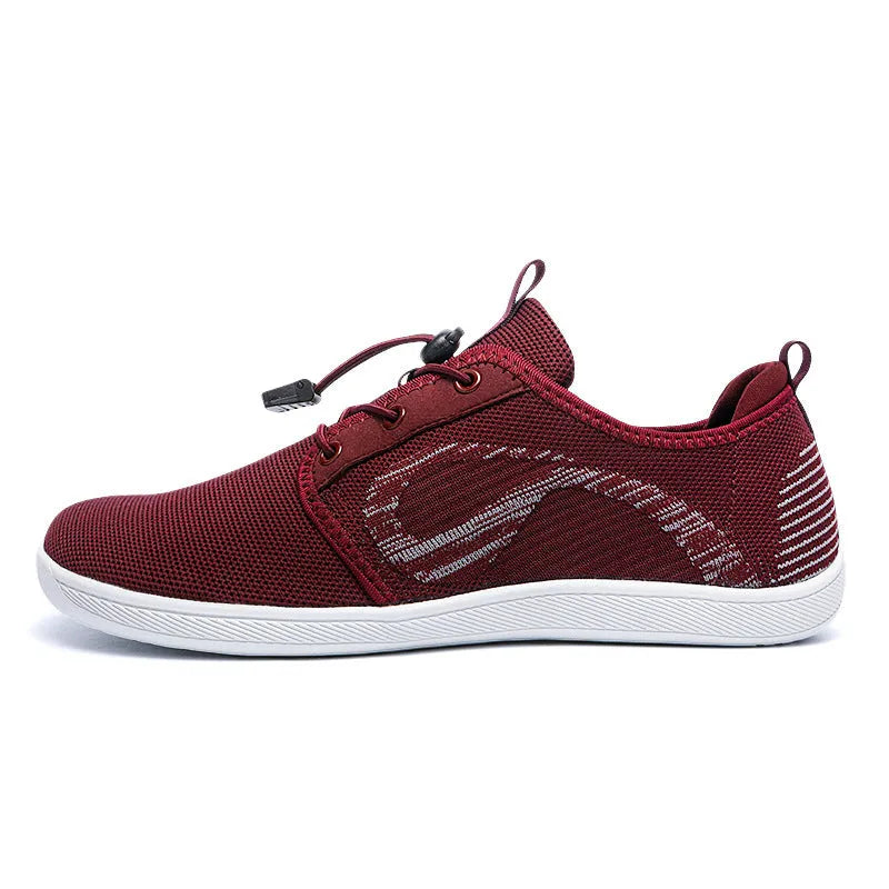 Men's black cloth casual shoes with soft sole and round wide toe on a solid background
