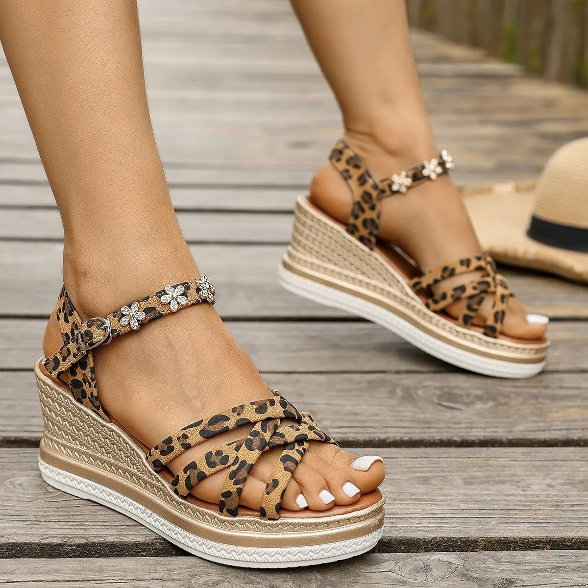 Light brown suede women's sandals with an ankle buckle and platform sole.