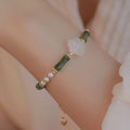 Women's Chinese style Hetian jade bracelet with bamboo joint design and shell pearl beads