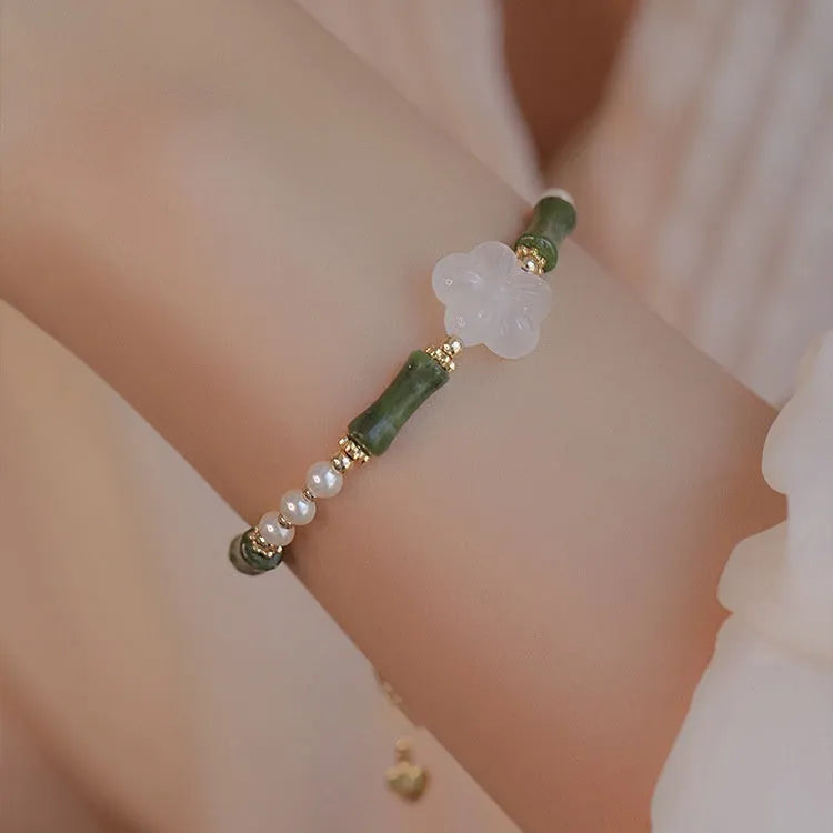 Women's Chinese style Hetian jade bracelet with bamboo joint design and shell pearl beads