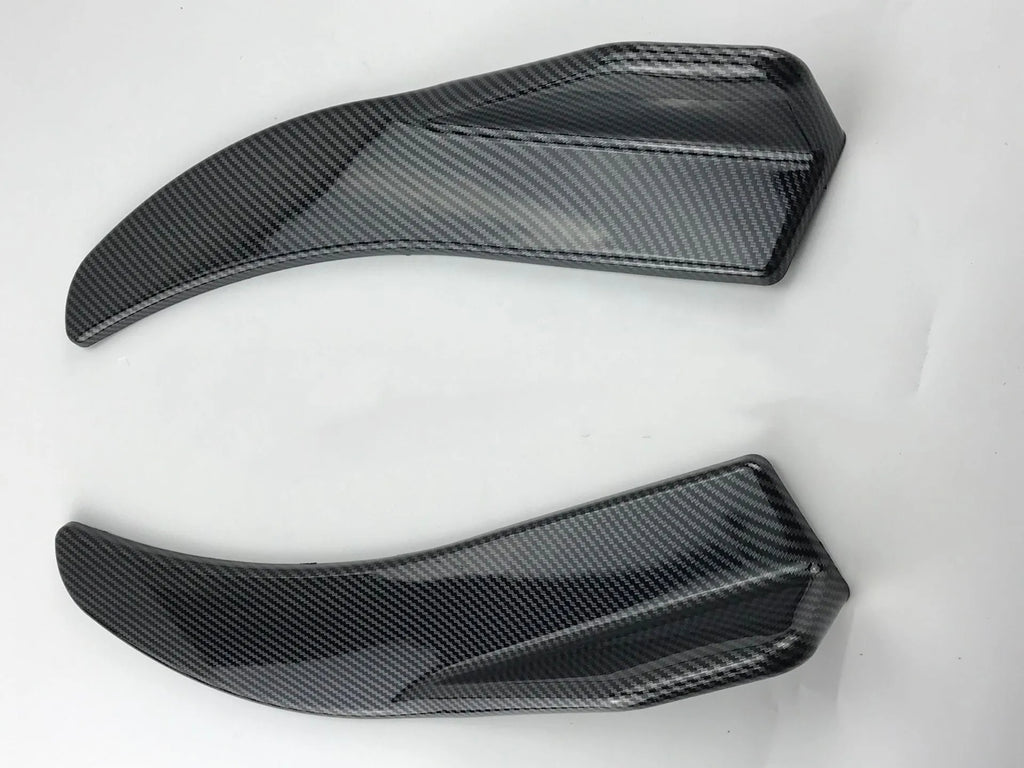 Pair of black ABS plastic car bumper deflector shovels with screw holes, 440mm wide.