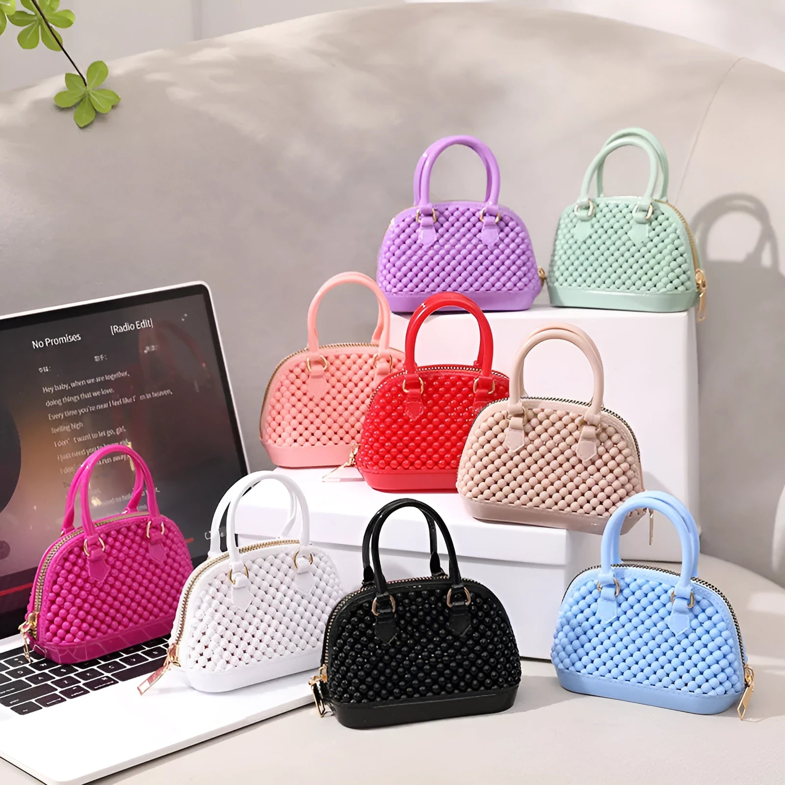 Translucent PVC jelly shell handbag with hollowed design and metal chain strap in apricot colour