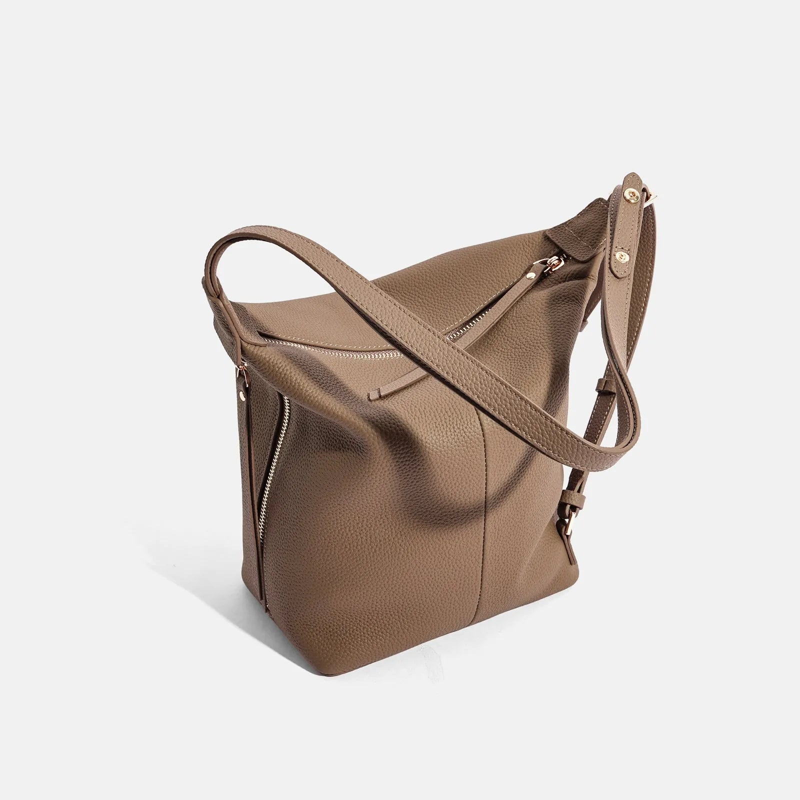 Women's genuine cowhide leather bucket shoulder bag in elephant grey colour showing soft construction and casual styling