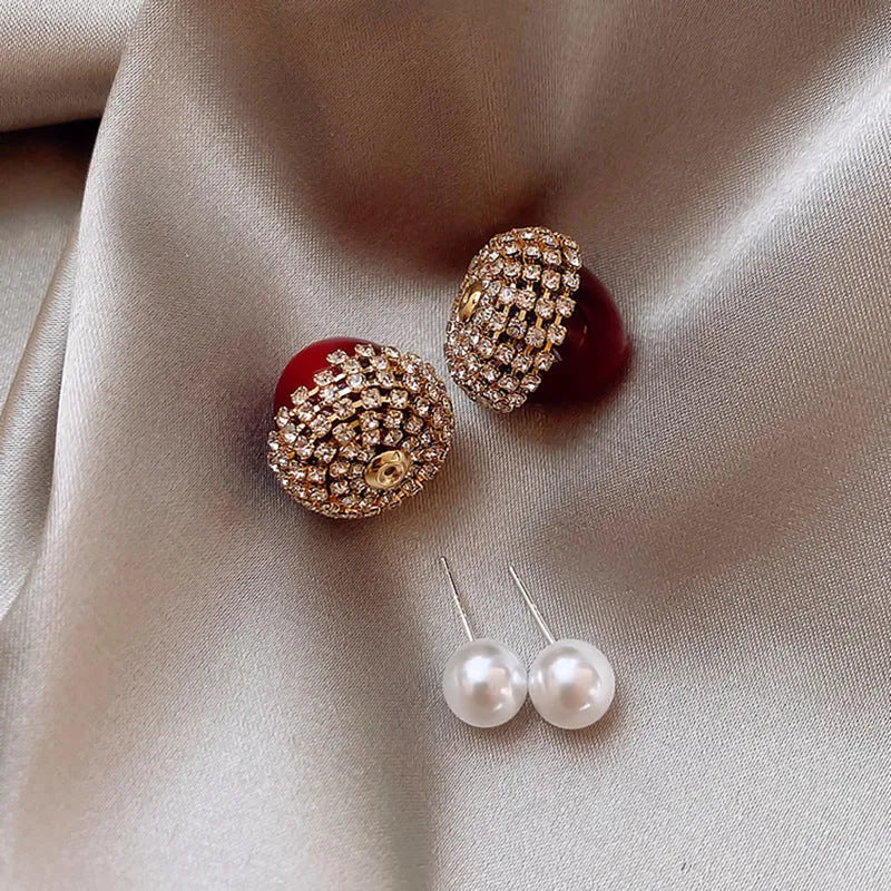 Women's bowknot stud earrings with rhinestone detail in Blue Pink Red White, alloy electroplated, individually packed.