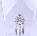 Silver-tone dream catcher feather pendant necklace with woven hoop, turquoise bead, and 46cm chain