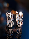 Champagne gold copper ear clip with white diamonds in fine bends and hitches design for women