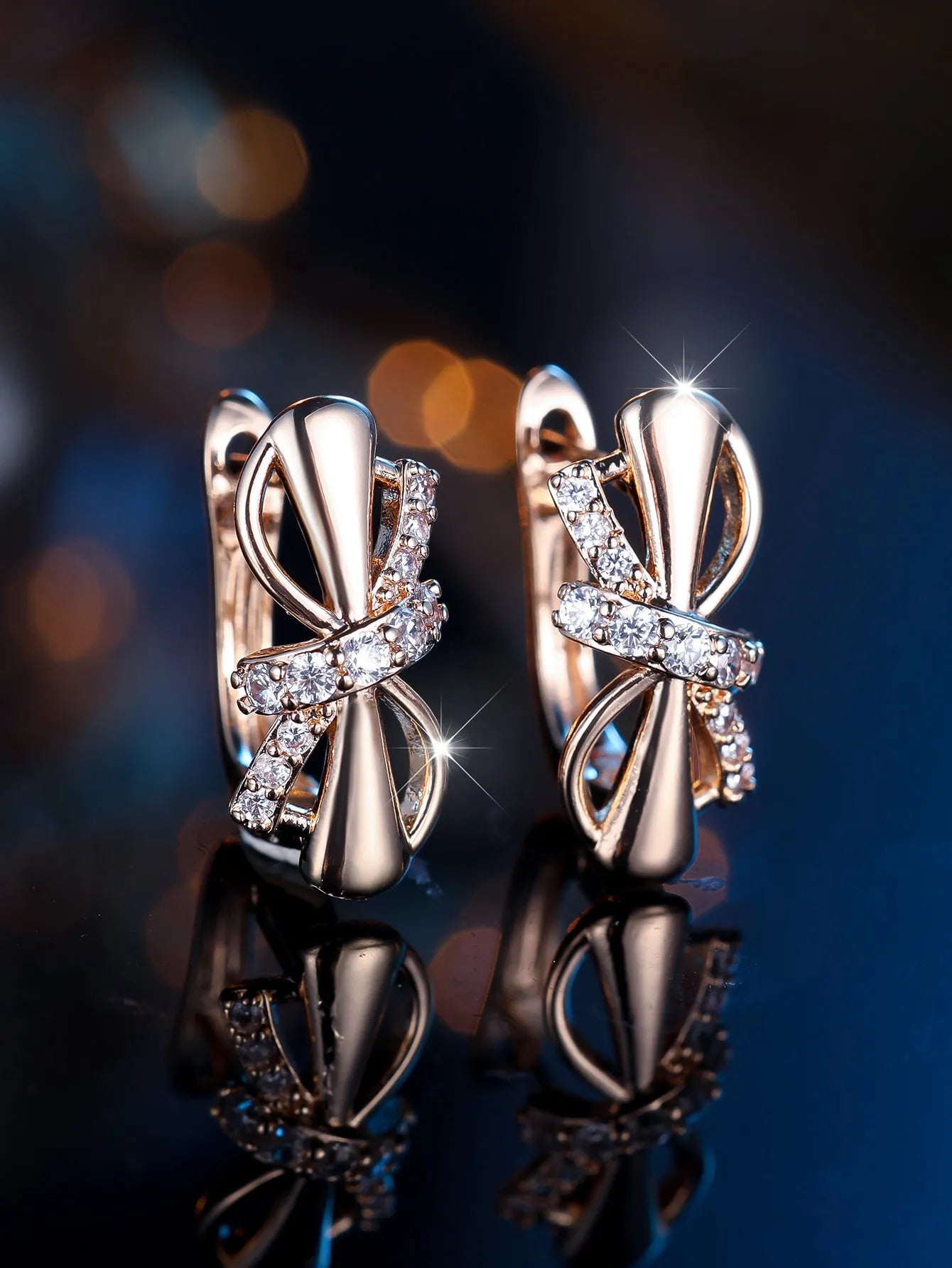 Champagne gold copper ear clip with white diamonds in fine bends and hitches design for women