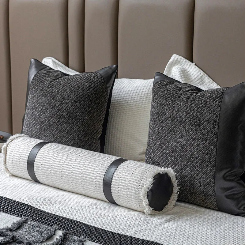 Modern grey and white plaid bed runner blanket and pillow set arranged on a double bed