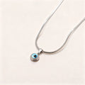 Angel Eyes titanium steel necklace with gold-plated eye pendant on 45.5cm snake bone chain