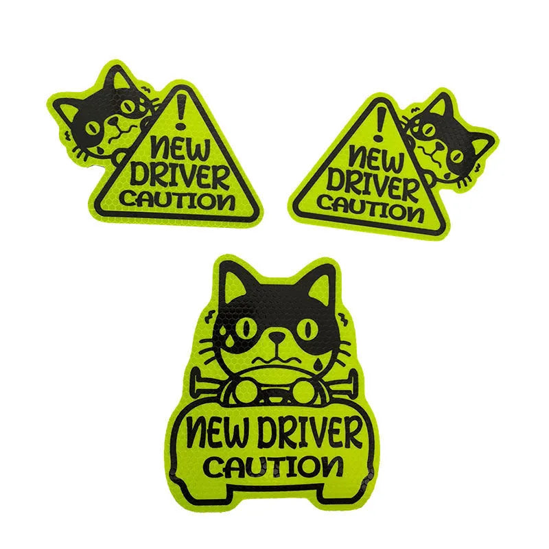 Set of three reflective magnetic stickers with cat, panda, and duck designs on a metal surface.
