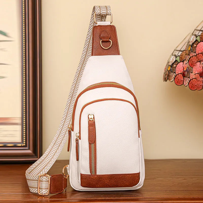 Women's soft brown PU messenger chest bag with crossbody strap and zip compartments.
