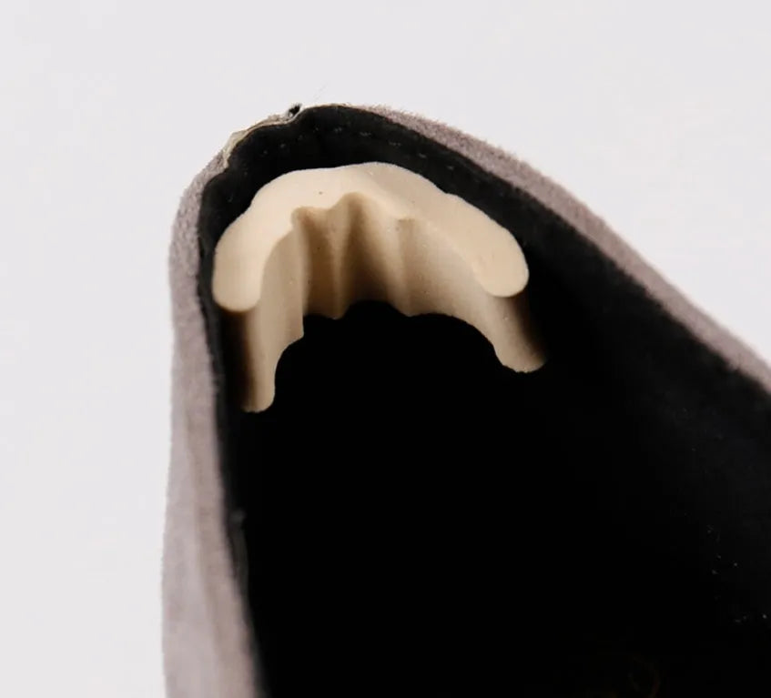 Beige EVA toe anti-slip pad with contoured shape for loose shoes, measuring 6.5 cm by 3 cm by 1.5 cm