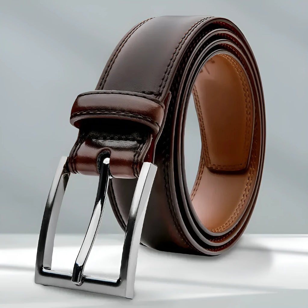 Men's brown genuine leather casual belt with alloy buckle on a plain background.