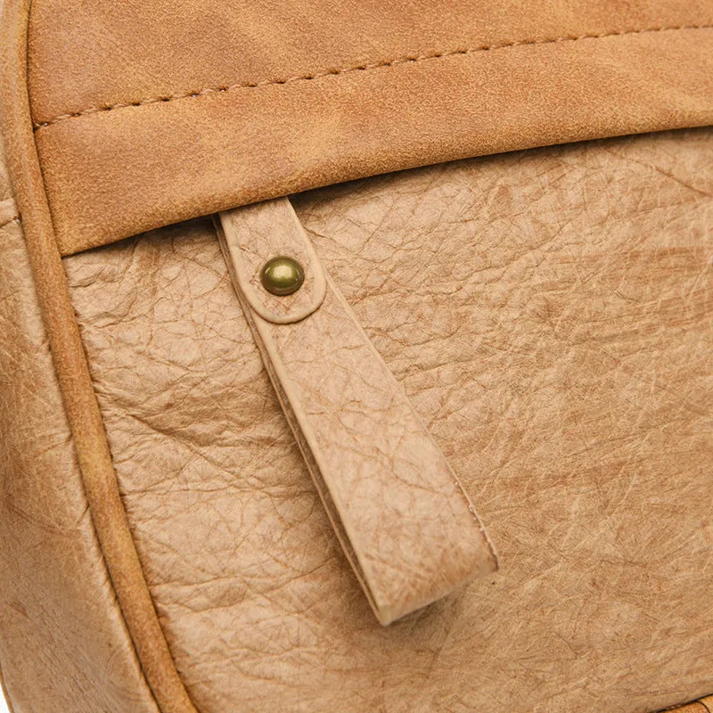 Men's waterproof paper crossbody bag in retro style showing black, brown and silver colour options