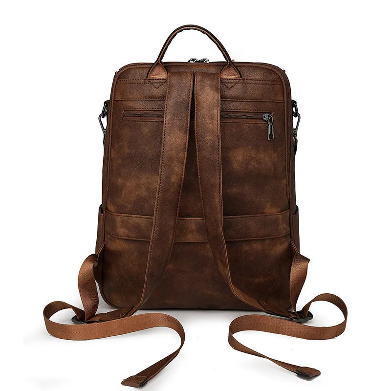 Retro college style PU backpack with curved shoulder straps, shown in one of six available colours.