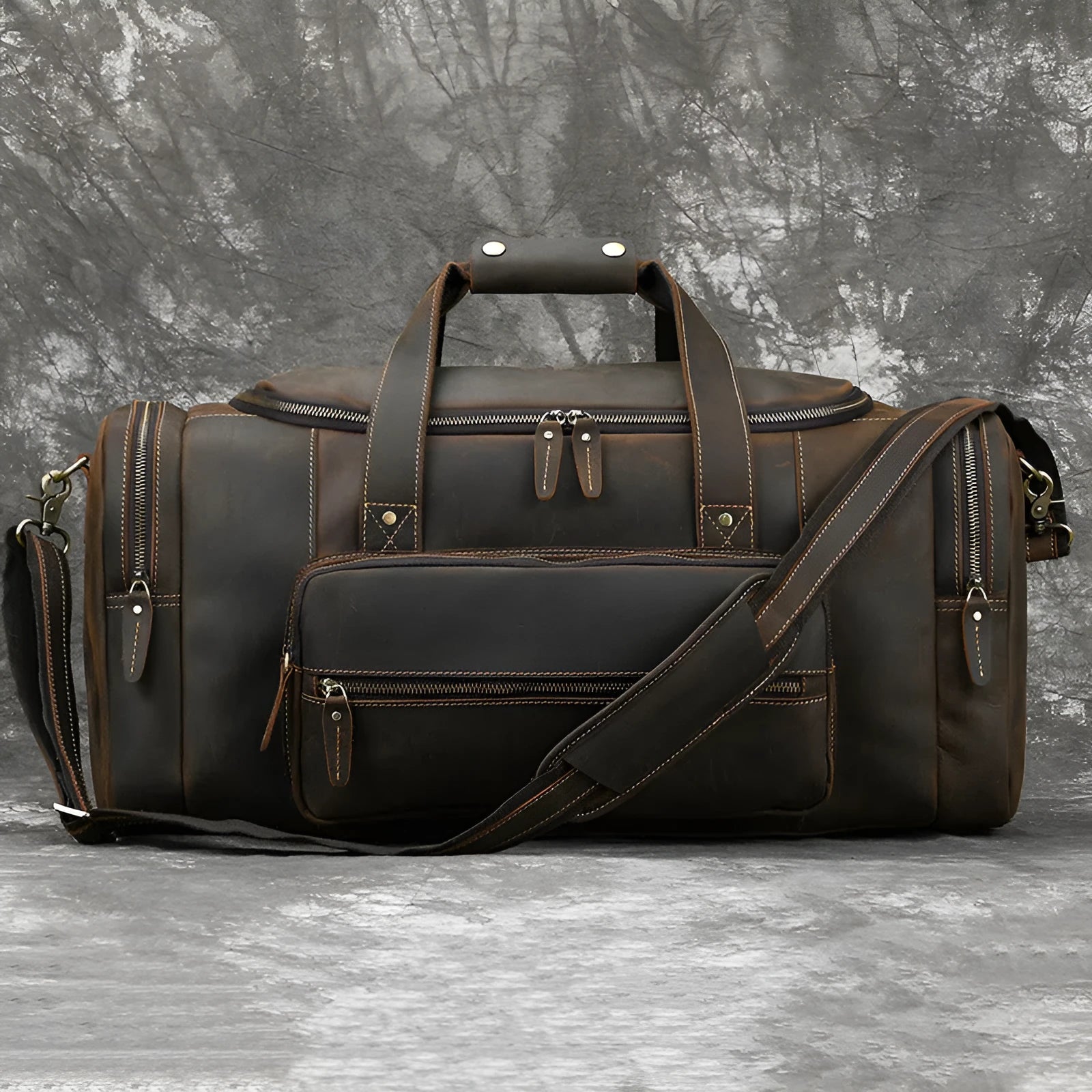 Men's full-grain cowhide leather crossbody bag in dark brown, with stitched seams and shoulder strap, 58cm size