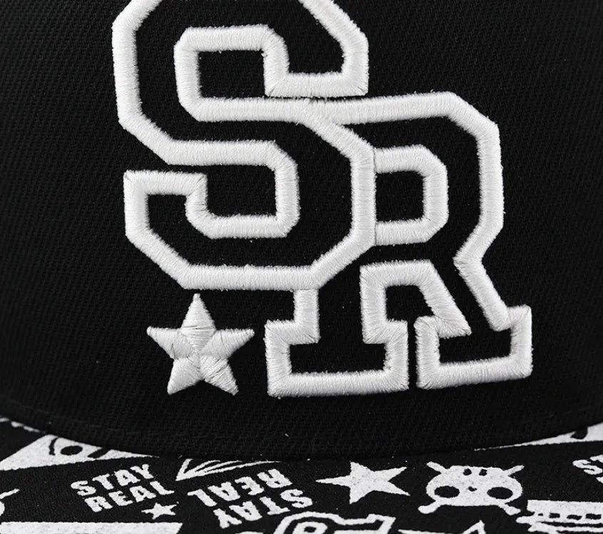 Adjustable black cotton baseball cap with embroidered lettering on the front, showing the dome crown and strap.