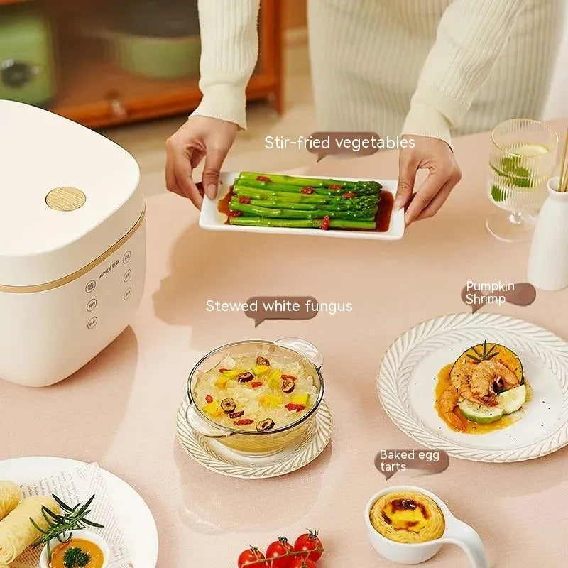White or beige plastic rice cooker with black crystal inner pot and digital display