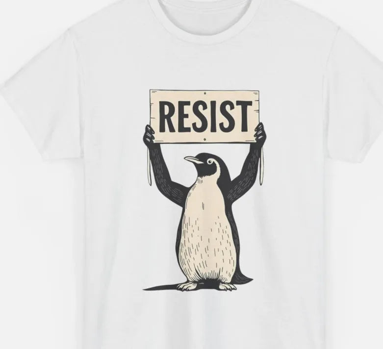 Straight cut loose fit cotton t-shirt in black on a hanger, showing round neck and short sleeves.