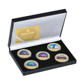 Five iron commemorative coins with Dubai building designs in a gift box