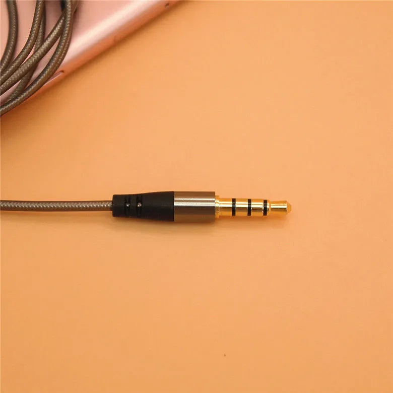 Titanium grey metal in-ear earphones with a braided aluminium foil and TPE cable and detachable connectors.