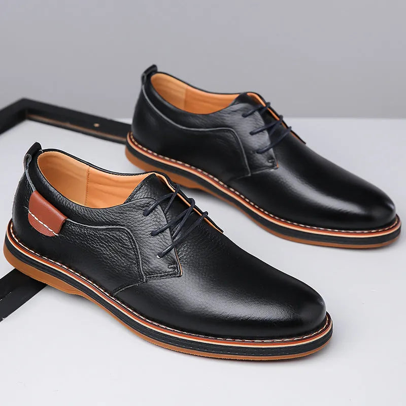 Men's business casual shoes in first layer cowhide, flat heel and round toe, black blue or brown